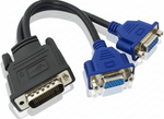 Two computer cables, one DVI and one VGA, on a white background