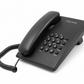 Black telephone with keypad on a white background
