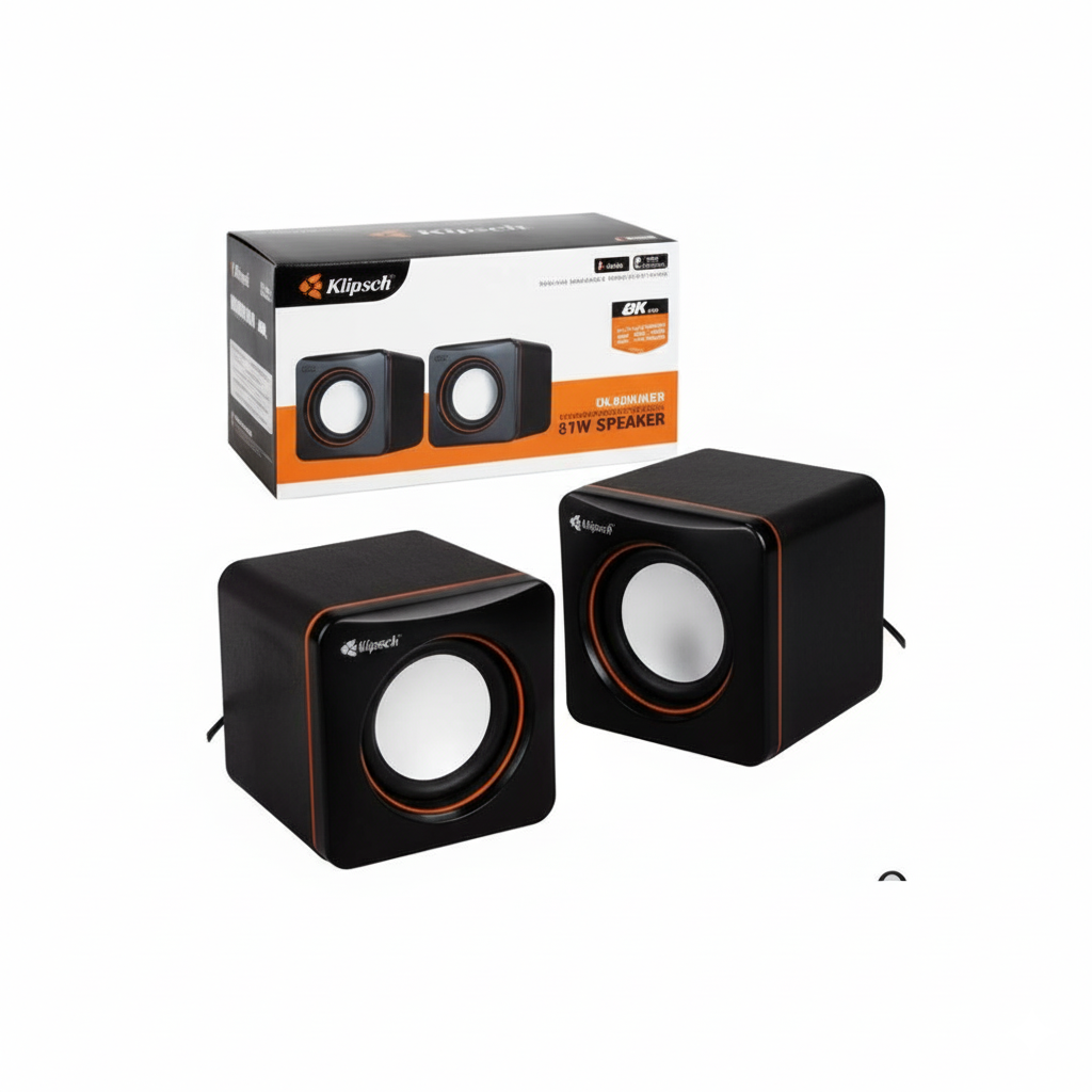 Black Klipsch speakers with packaging on a white background