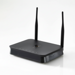 Black wireless router with antennas on a white background