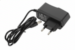 Black power adapter with cable on a white background