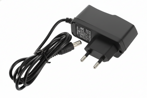 Black power adapter with cable on a white background