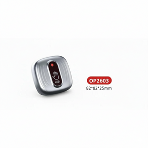 Metallic device with a red light and 'OP2603' label on a white background
