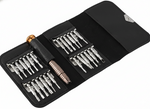 Set of screwdrivers in a black case on a white background
