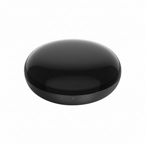 Black round electronic device on a white background