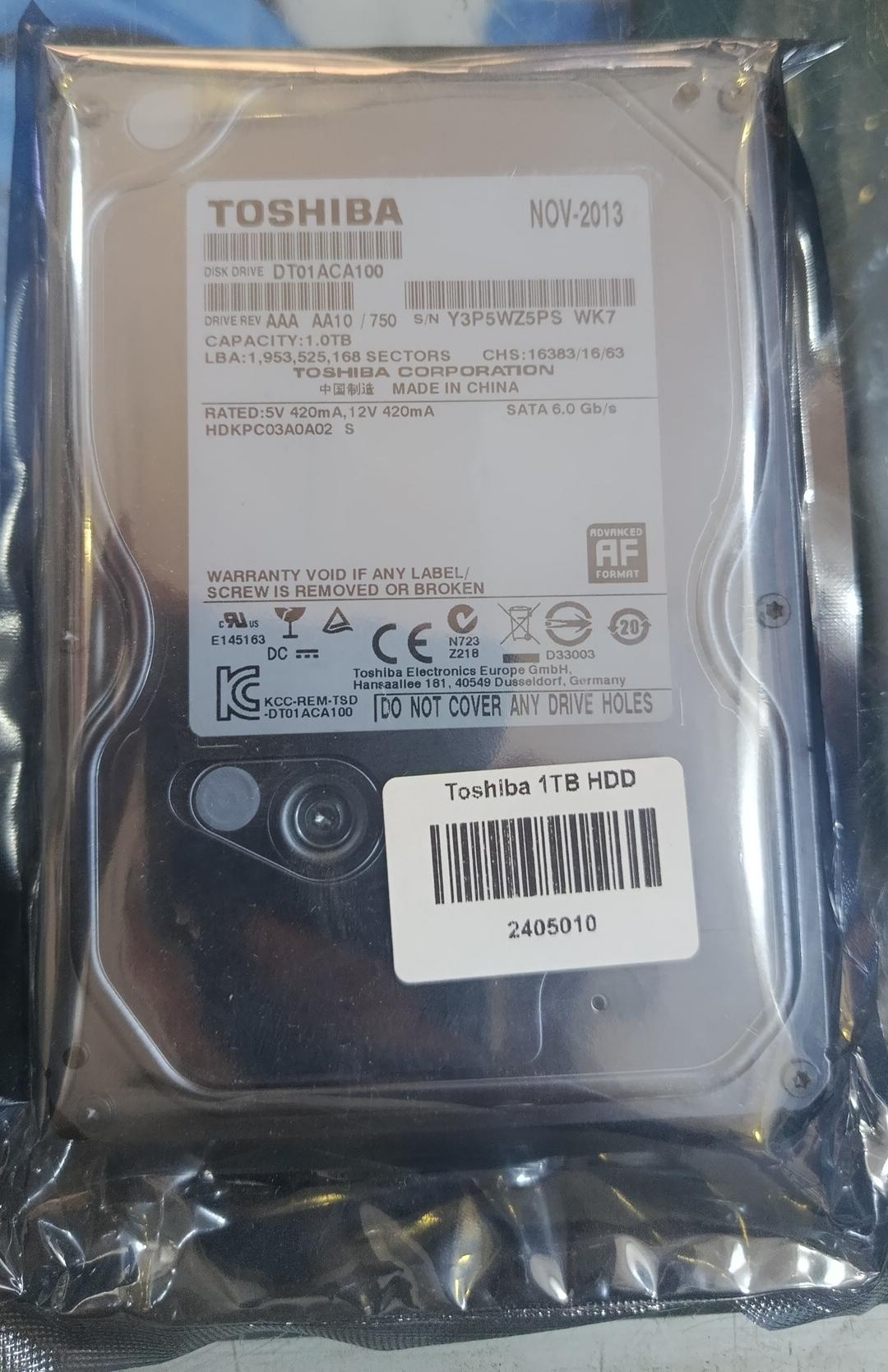 Toshiba 1TB hard drive side view storage device