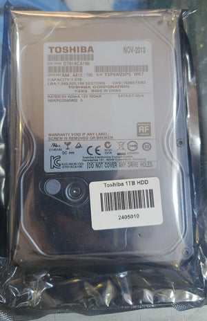 Toshiba 1TB hard drive side view storage device