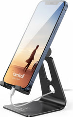 Phone stand with smartphone displaying a sunset scene, branded 'lamicall'.