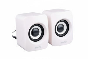 Pair of white cube-shaped speakers with black drivers on a white background