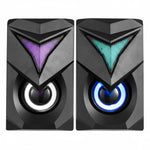 Pair of black speakers with colorful LED lights on a white background