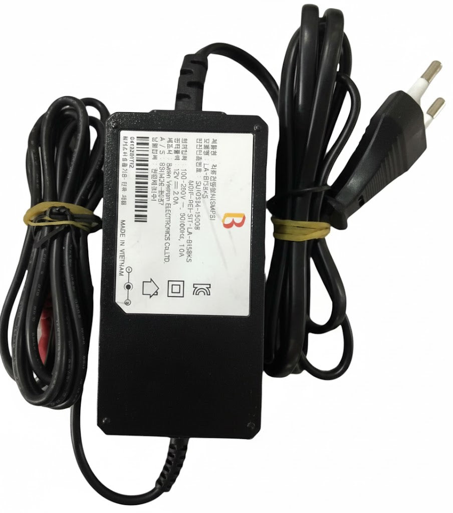 Black power adapter with label on a white background
